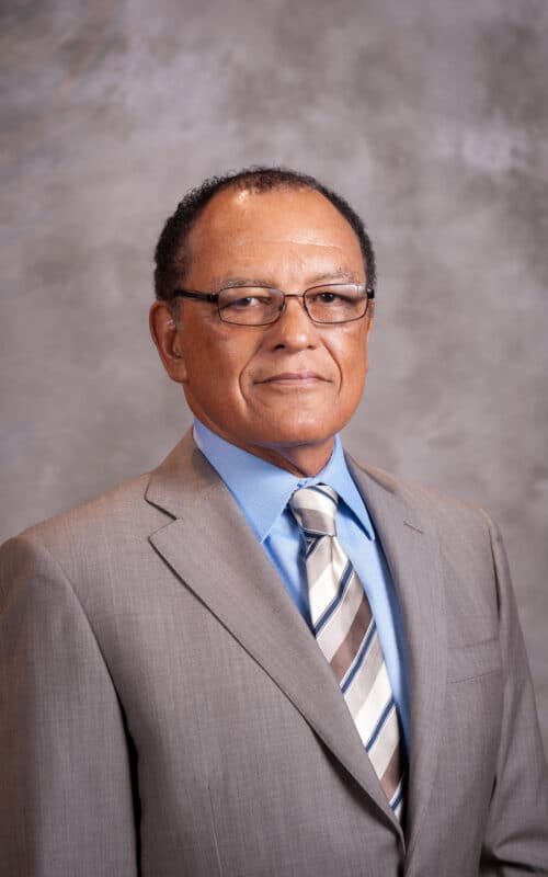 a man wearing a suit and tie
