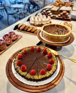 a cake with fruit on top of a table