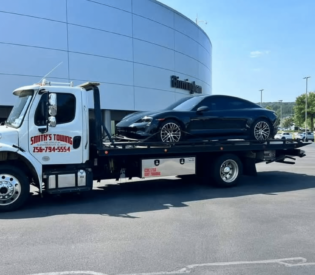 A Truck Is Parked In A Parking Lot